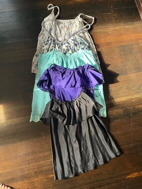 Lot of five very cute, excellent condition camisoles/ tank tops
All size medium